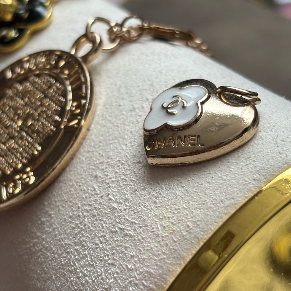CHANEL Black and Gold Floral Pendant OR CHANEL Heart with White Camilla Floral s - Picture 2 of 5